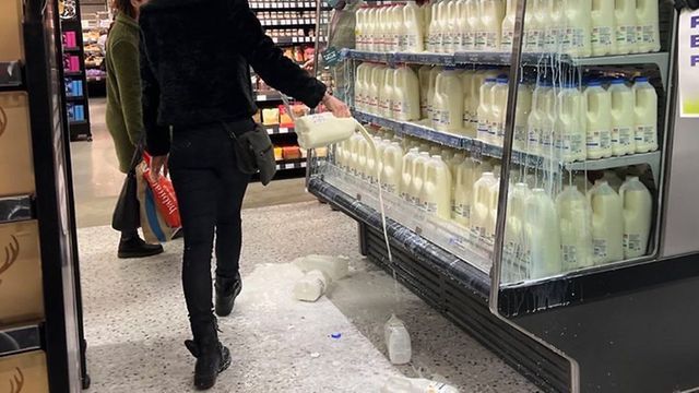 Four arrested after milk poured on floor of M&S