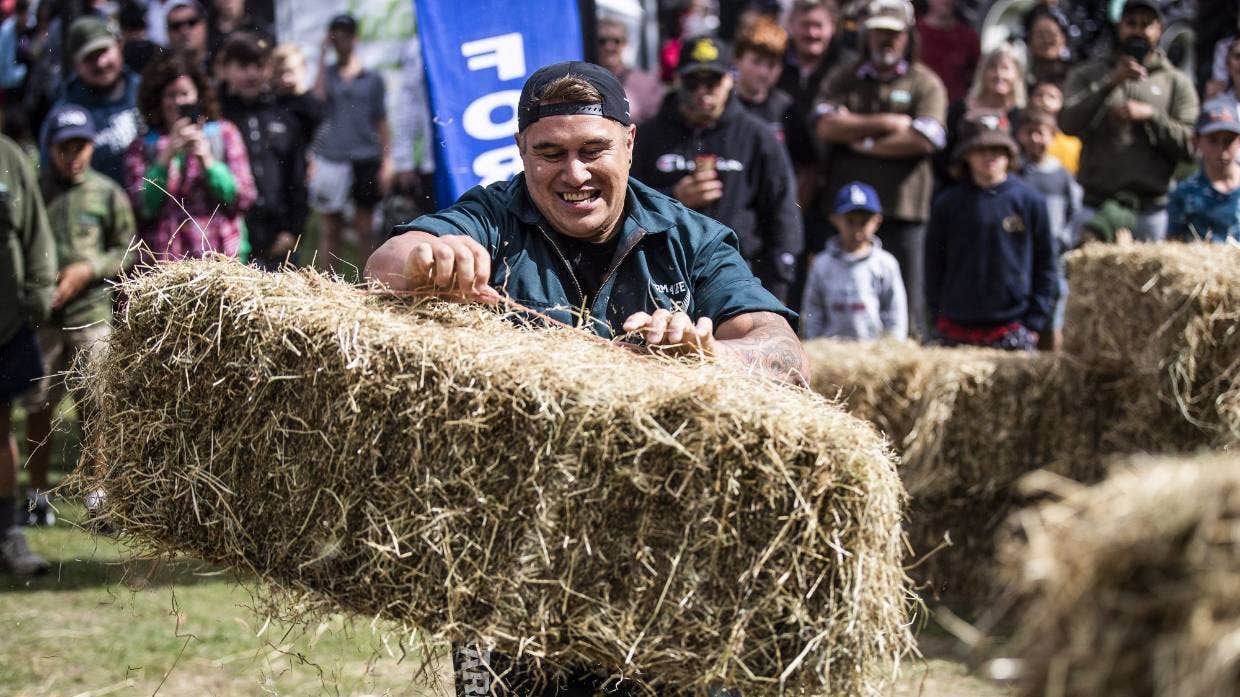 Tangaroa Walker racing to stack hay bales at the Rural Games in Palmerston North in 2021.
